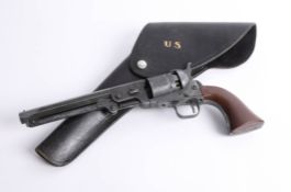 A replica U.S Naval pistol and U.S leather holster.