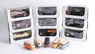 Nine boxed model cars by Packard and some loose diecast models.