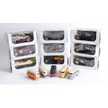 Nine boxed model cars by Packard and some loose diecast models.