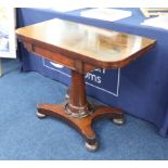 A 19th century mahogany fold over card table.