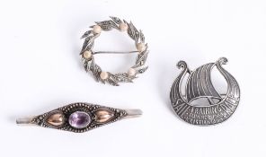 Three brooches including silver Norwegian brooch marked Tinn.