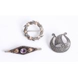 Three brooches including silver Norwegian brooch marked Tinn.