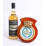 A bottle of ten year old Springbank Scotch whisky bottled for HMS Campbeltown, and a mounted