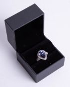 An 18ct tanzanite pear shape ring, size N.