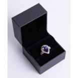 An 18ct tanzanite pear shape ring, size N.