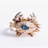 An 18ct ring in the form of a crab set with sapphire, ruby and diamonds, size O.