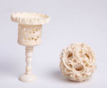 A Chinese carved ivory puzzle ball.