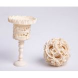 A Chinese carved ivory puzzle ball.