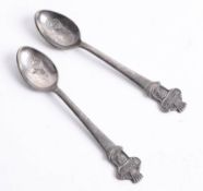 Two Rolex collectors spoons.