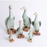 Six oriental duck figures, tallest 25cm.