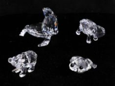 Swarovski Crystal, small collection of animals including elephants, a seal, and a frog with a crown.