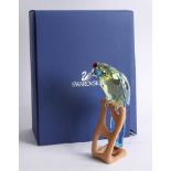 Swarovski Crystal, Paradise Birds 'Green Rosella', condition as new, on a maple wood stand, complete