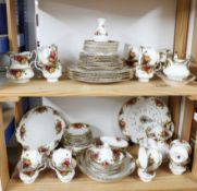 A collection of seventy four pieces of Royal Albert 'Old Country Roses'.