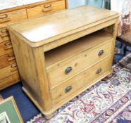 A pine chest fitted with two drawers.
