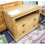 A pine chest fitted with two drawers.