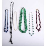Collection of necklaces including malachite style and other coloured necklaces also jet.