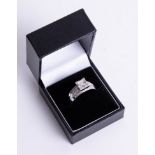 An 9ct white diamond cluster square set ring, size R.