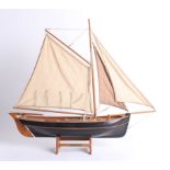 A wooden model of the 'The Hooker' Fishing Boat.