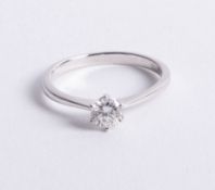 An 18ct white gold and diamond solitaire ring, approx 0.50ct, size M.