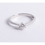 An 18ct white gold and diamond solitaire ring, approx 0.50ct, size M.