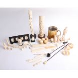 Collection of various antique carved ivory/bone objects.