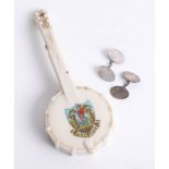 Crested Ware, a banjo with Helston crest together with a pair of silver cufflinks.