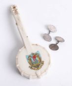 Crested Ware, a banjo with Helston crest together with a pair of silver cufflinks.