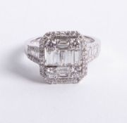 An 18ct white gold and diamond halo ring, approx 2.25ct, size N.