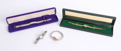 A Ladies 9ct gold wrist watch together with three other watches including Marcasite and silver.
