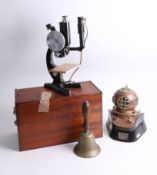 An old A.R.P. bell, a Bank Of England sub aqua diving officers award in a form of a vintage diving