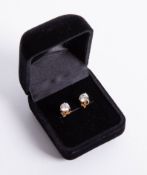 An 18ct gold and diamond stud earrings approx 1.00ct.