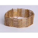 A gold gate bracelet, possibly 18ct, 37g.