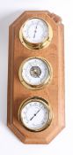 Robert Thompson Of Kilburn, a 'Mouseman' weather centre set with brass cased thermometer,