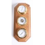 Robert Thompson Of Kilburn, a 'Mouseman' weather centre set with brass cased thermometer,