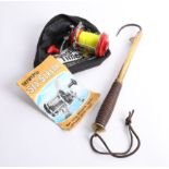 An anglers gaff hook, with wood handle, extendable together with an Intrepid Sea-Streak fishing reel