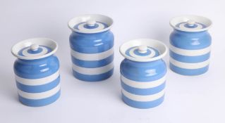 Four Cornish ware storage jars,15cm & 17cm high (4).