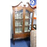 An Edwardian mahogany and inlaid display cabinet with swan neck pediment, width 92cm.