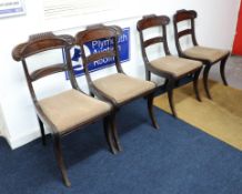 Set of four early Victorian mahogany framed dining chairs with sabre legs.