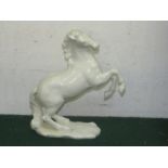 HUTSCHENREUTHER WHITE PORCELAIN MODEL OF A STALLION, THE BASE MARKED G. GRANGET, HEIGHT 11.5CM