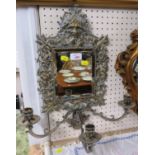 BRASS THREE-BRANCH GIRANDOLE MIRROR, RECTANGULAR GLASS, THE FRAME MOULDED WITH GREEN MAN MASK AND