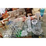 LARGE SELECTION OF ASSORTED GLASS INCLUDING STOPPERED DECANTERS, STEMMED DRINKING GLASSES, BOWLS