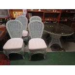 CIRCULAR PALE GREEN PAINTED WICKER CONSERVATORY TABLE WITH GLASS TOP AND FOUR MATCHING CHAIRS WITH