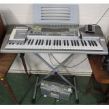 CASIO CTK-900 ELECTRIC KEYBOARD WITH FLOOR STAND, FOOT PEDAL AND SHEET MUSIC STAND