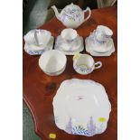 GRAFTON CHINA PART TEA SET DECORATED WITH FLOWERS INCLUDING CUPS, SAUCERS AND TEAPOT
