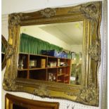 RECTANGULAR BEVEL EDGED WALL MIRROR IN SUBSTANTIAL GILT EFFECT FRAME