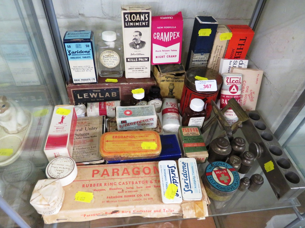 SHELF OF VINTAGE MEDICAL AND PHARMACEUTICAL ITEMS