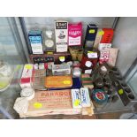SHELF OF VINTAGE MEDICAL AND PHARMACEUTICAL ITEMS