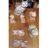 SEVEN ORIENTAL CERAMIC CAT ORNAMENTS WITH FLORAL DECORATION