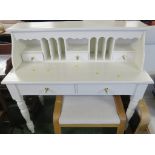CREAM PAINTED PINE TWO DRAWER DESK WITH COMPARTMENTED TOP SECTION WITH BRASS HANDLES
