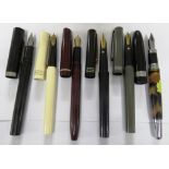FOUR OSMIROID FOUNTAIN PENS, SHEAFFER FOUNTAIN PEN AND ONE OTHER